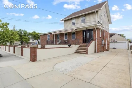 Homes for sale in Queens | View 407 Beach 124th Street, TOWNHOUSE | 6 Beds, 3 Baths