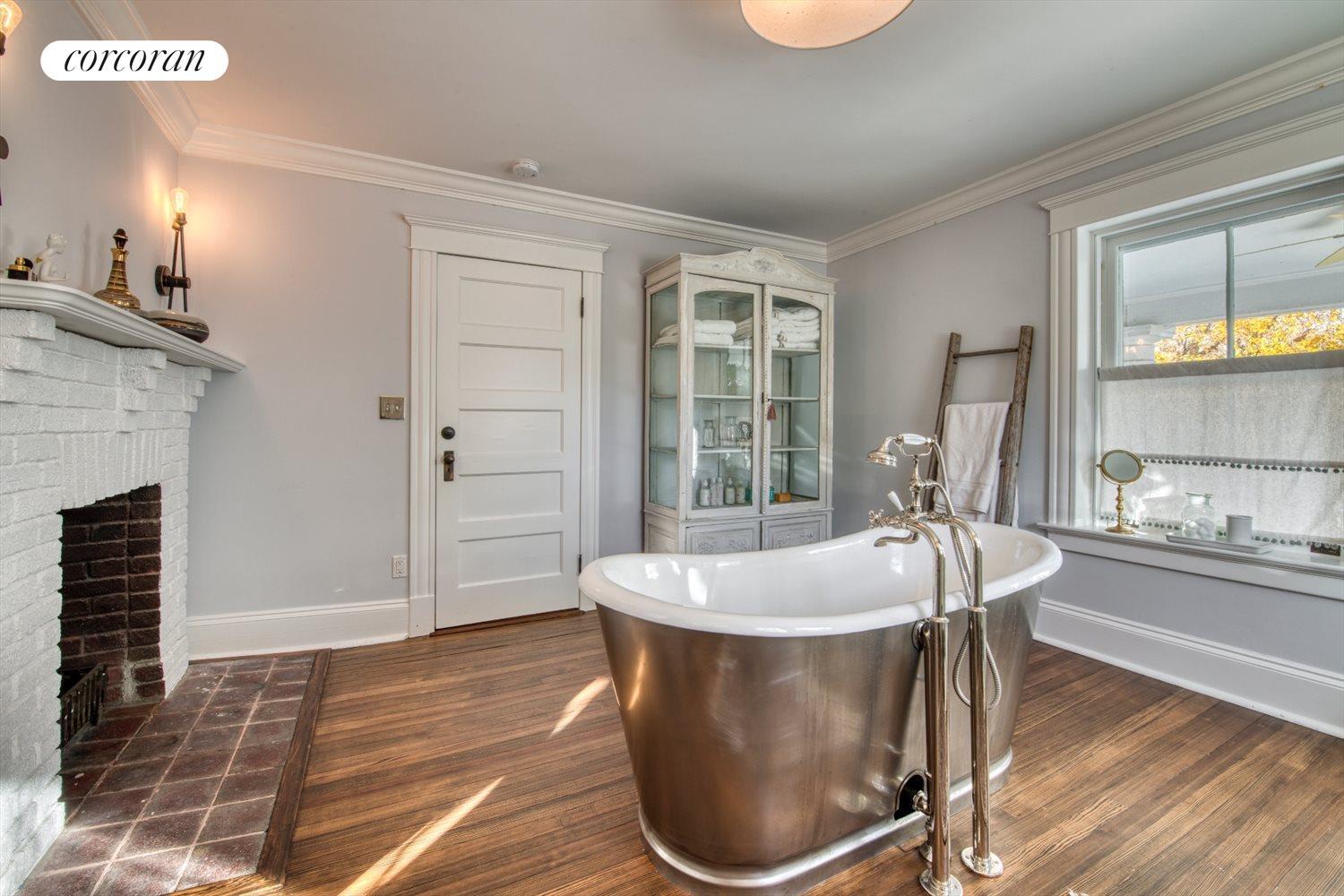 The Hamptons Real Estate | View 151 North Ferry Road | Copper clad bath and fireplace | View 18