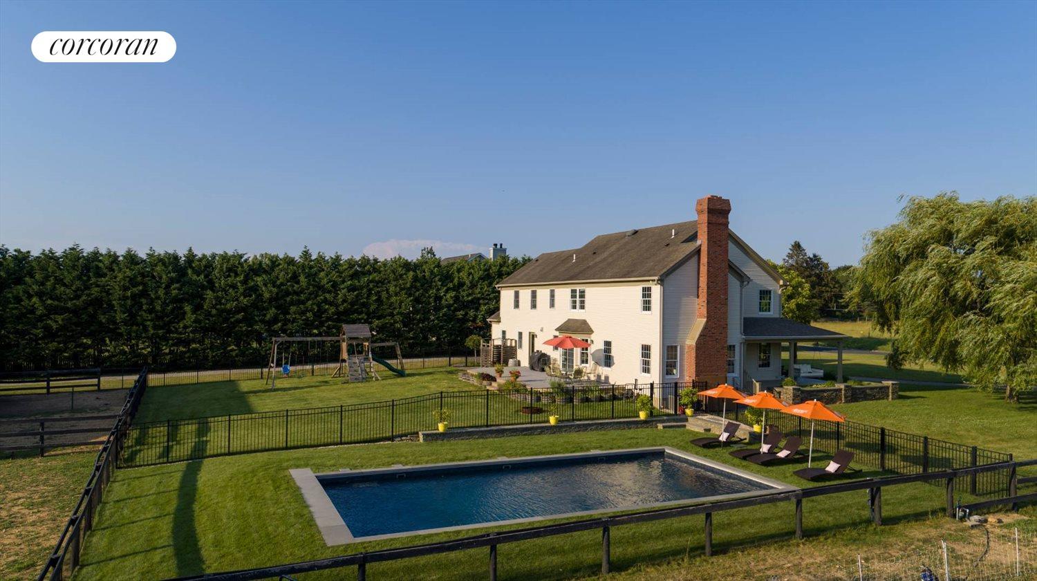 The Hamptons Real Estate | View 425 Jacobs Lane | Back of House + Pool | View 4