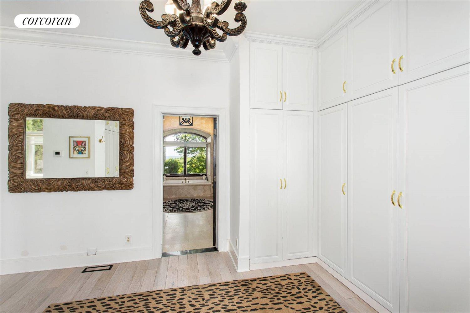 The Hamptons Real Estate | View 3875 Hallock Lane Ext | Primary Walk-In Closet | View 15