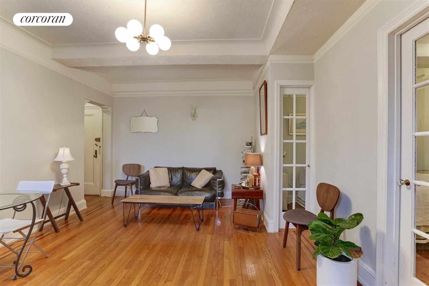 New York City Real Estate | View 235 East 22nd Street, 6R | Reverse Living Room | View 2