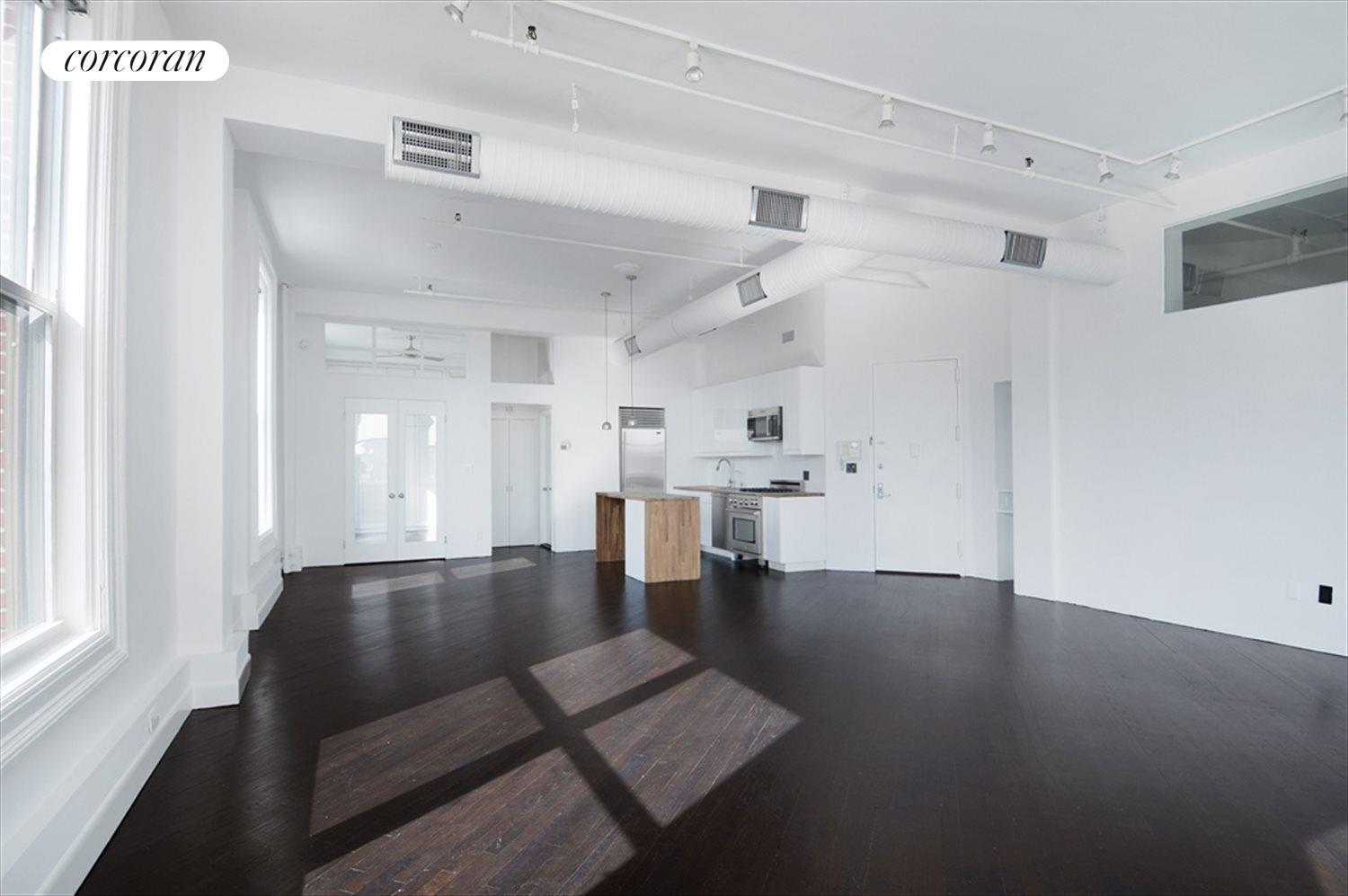 New York City Real Estate | View 476 Broadway, 10-M | Kitchen / Living Room | View 3