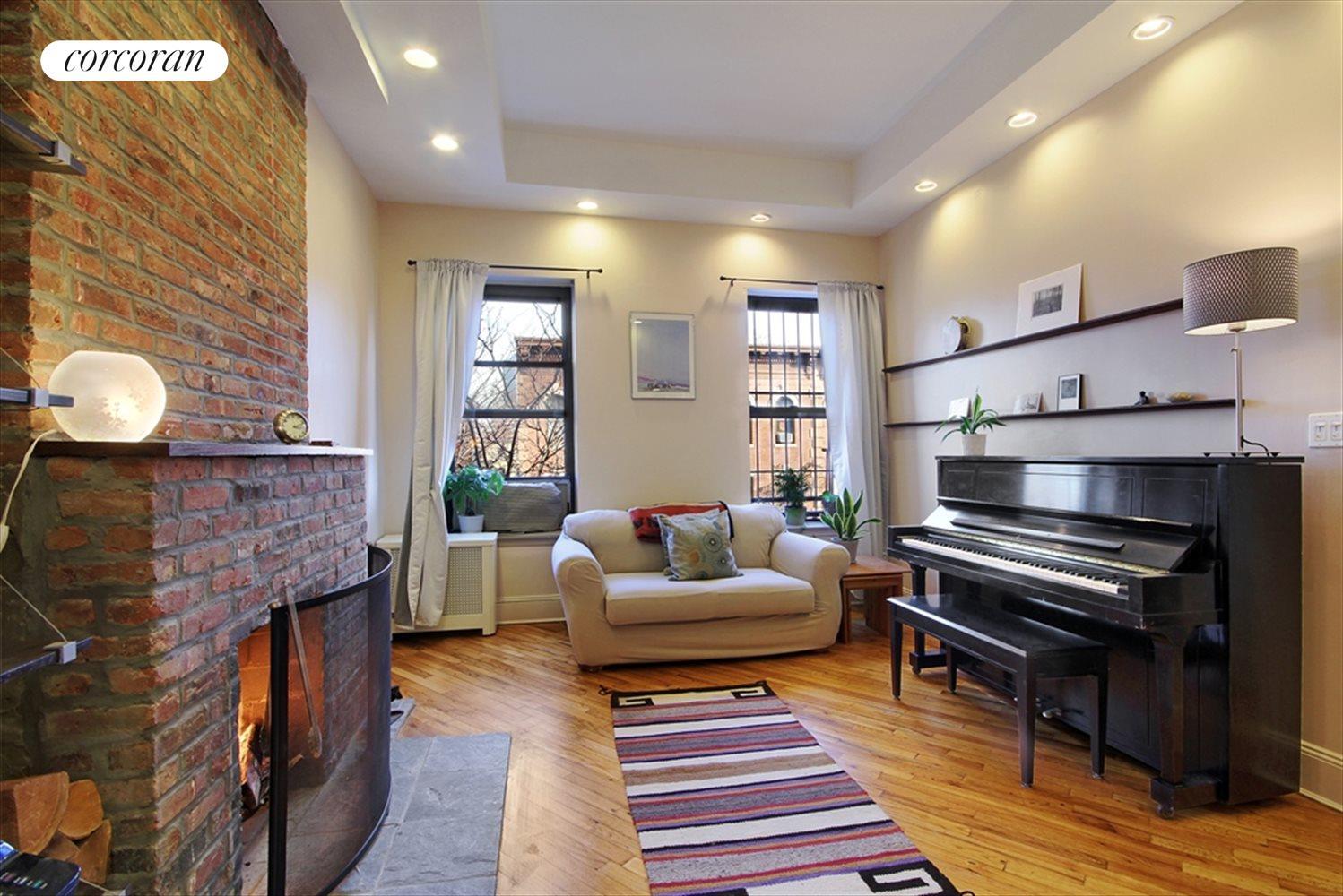 New York City Real Estate | View 262 Bergen Street, 4F | Exposed brick fireplace | View 13