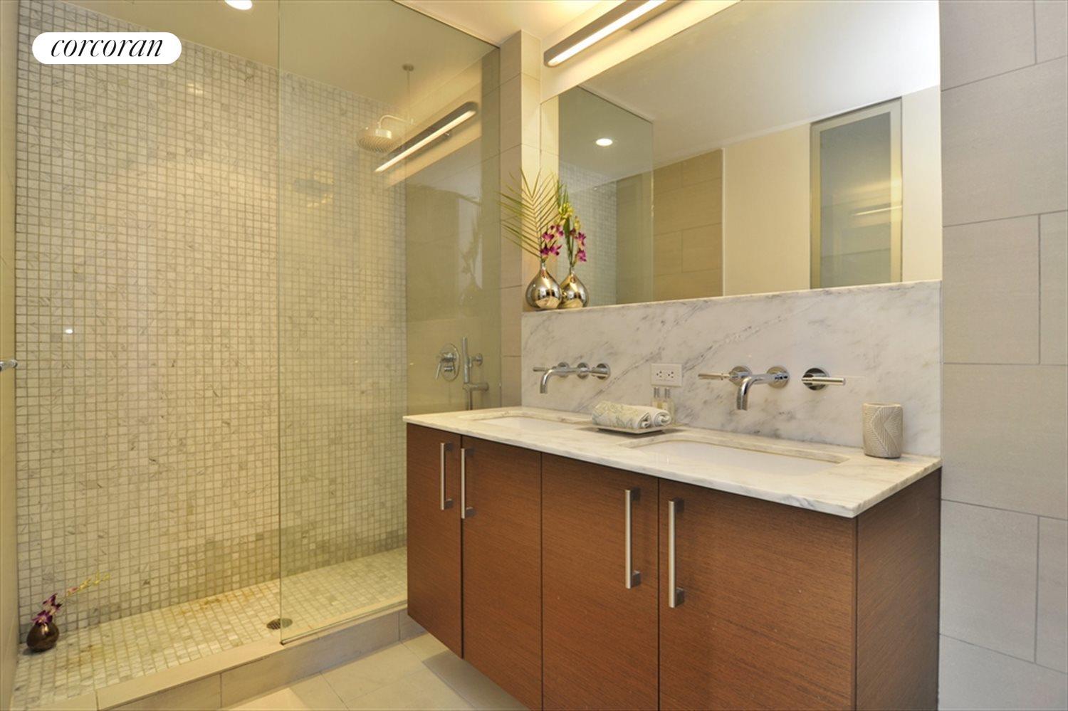 New York City Real Estate | View 21-45 44th Drive, 6H | Master bathroom with walk-in shower | View 4